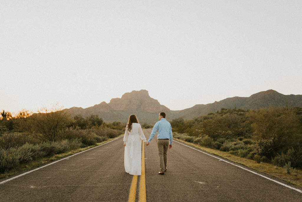Happy couple take engagement photos in Arizona