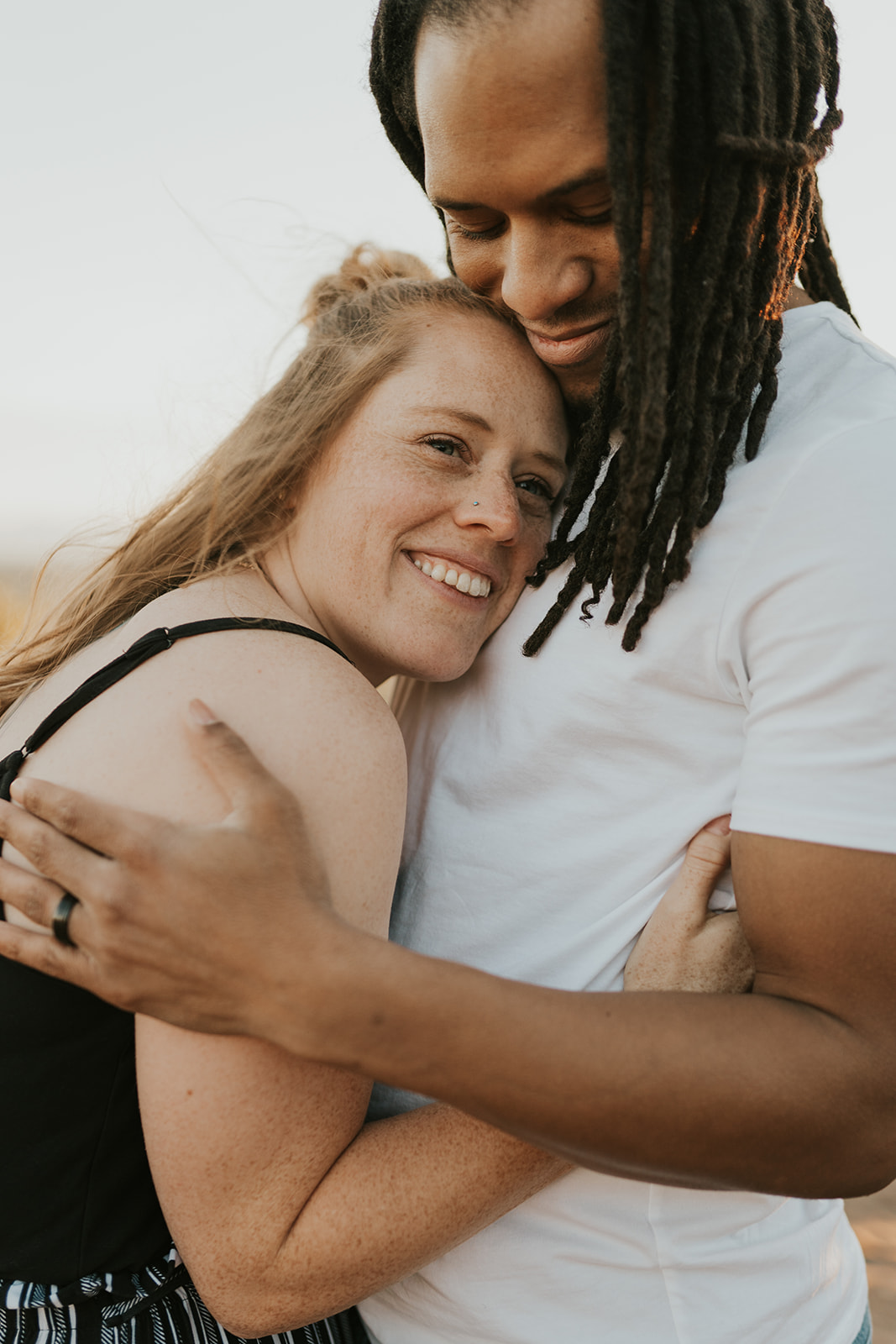 Smiling Couple in Engagement Photo